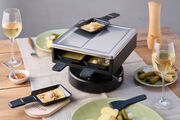Kabelloser Raclette-Aufsatz SIERRE von Kisag sorgt für sicheren Genuss - drinnen wie draussen